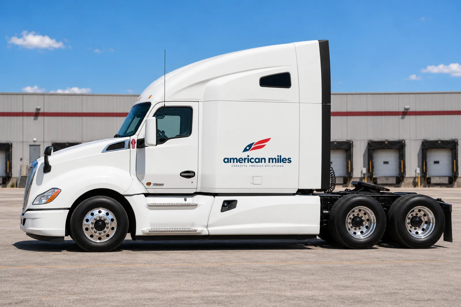 White Kenworth T680 sleeper tractor in American Miles livery, side view