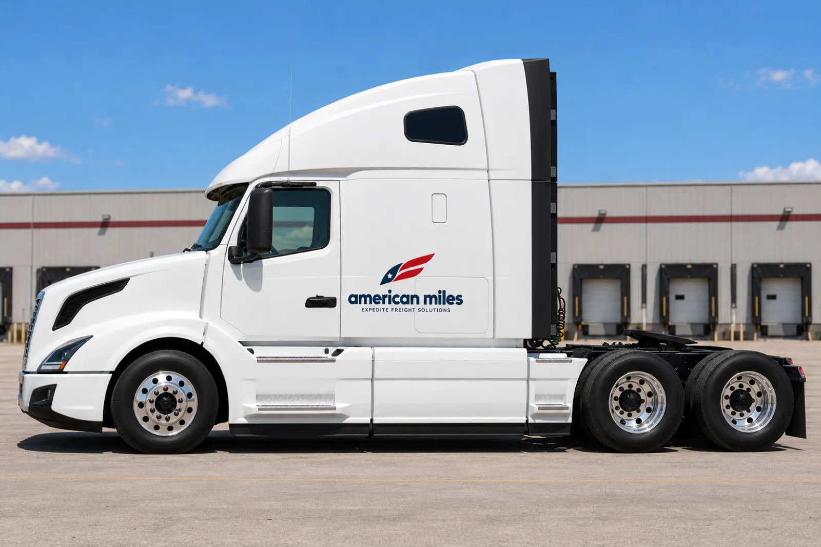 White Volvo VNL sleeper tractor in American Miles livery, side view