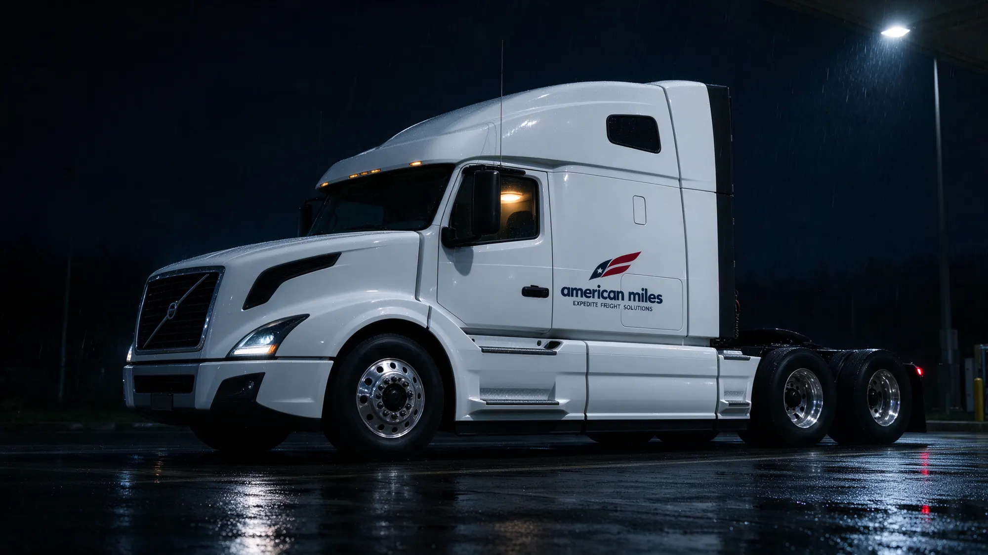 American Miles Volvo VNL ready at night, cab light on